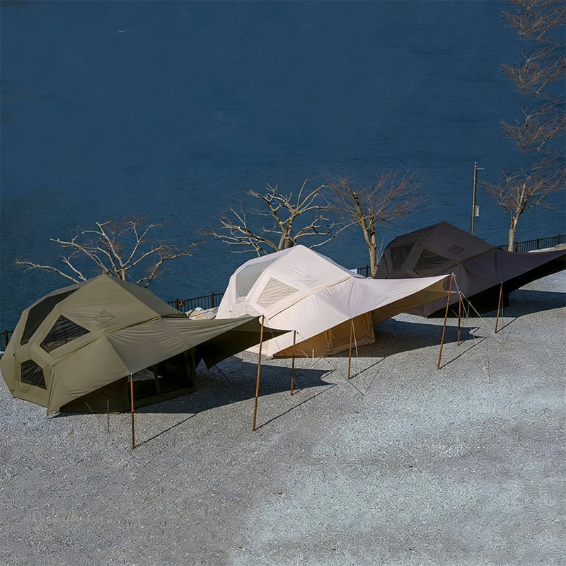 Large Inflatable Family Tent with a spacious living area, covered front awning, outdoor seating, and practical layout for family camping.