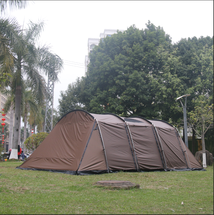 Inflatable Tunnel Tent set up outdoors as a covered passage, showing its enclosed walkway design and placement within an event area.