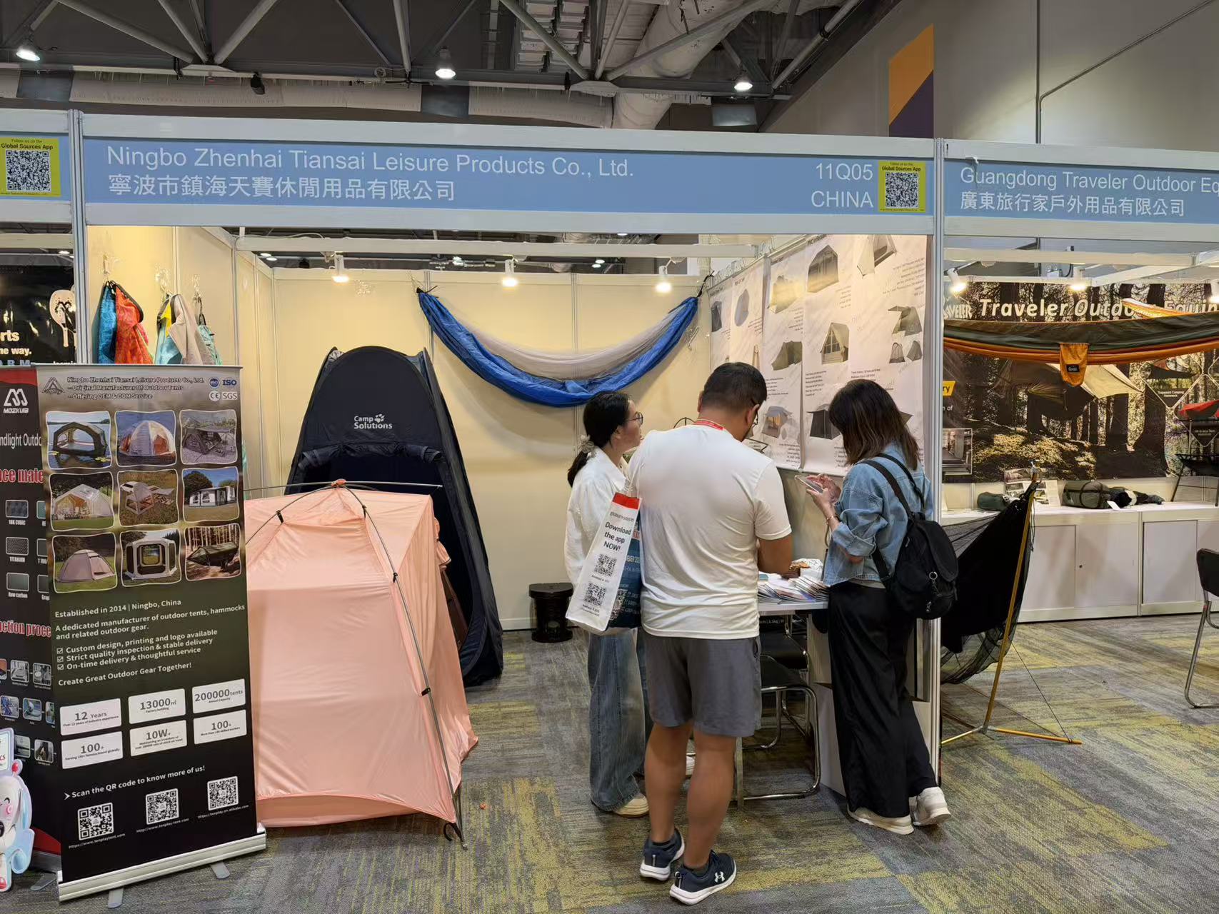 Visitors viewing products and speaking with the Tenplay team at the Hong Kong exhibition